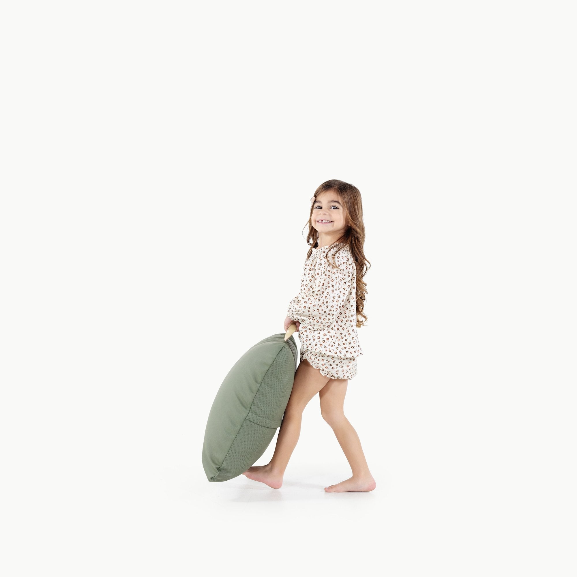 Thyme / Square@Kid holding the Thyme Mini Square Floor Cushion