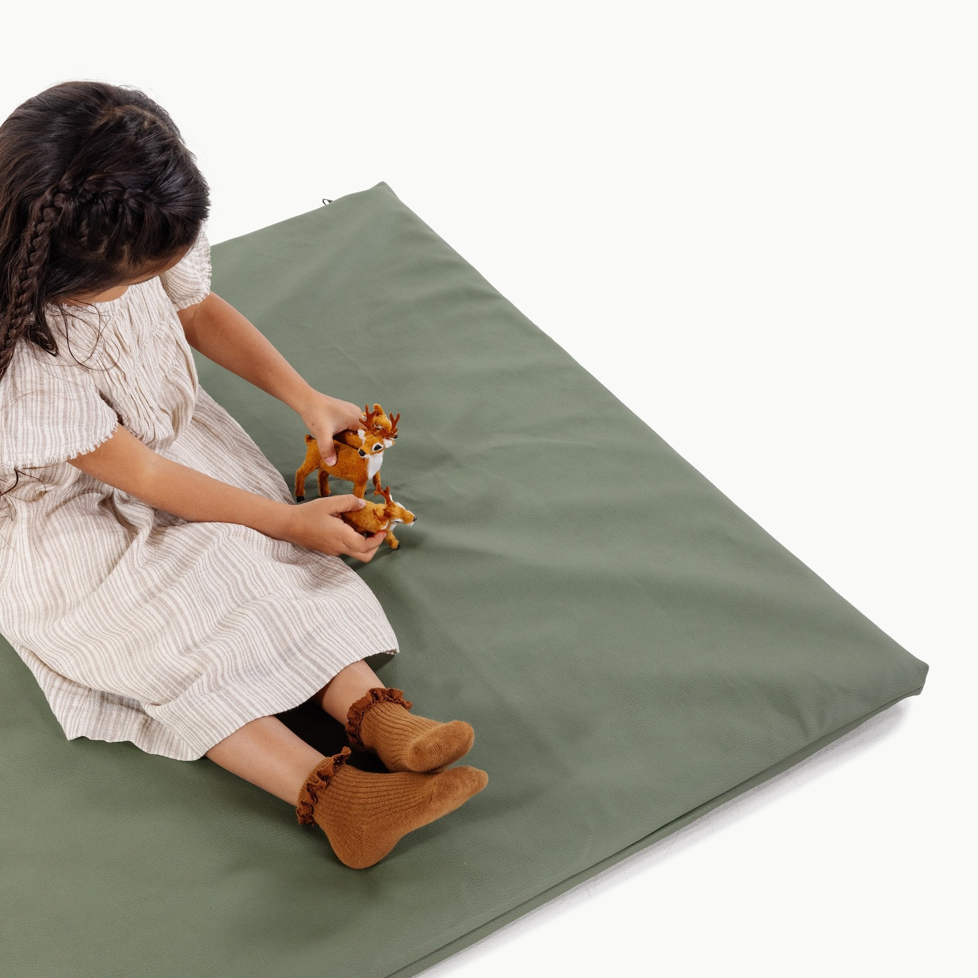 Thyme / Square@Overhead of Kid playing on the Thyme Padded Mini Square