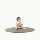 Thyme / Circle@Baby sitting on the Thyme Circle Quilted Mat