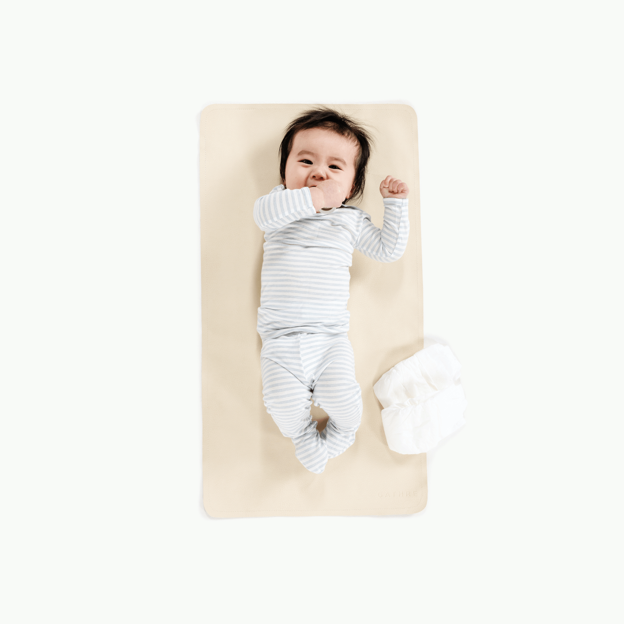 Wool (on sale)@Overhead of baby sitting on the Wool Micro+ Mat