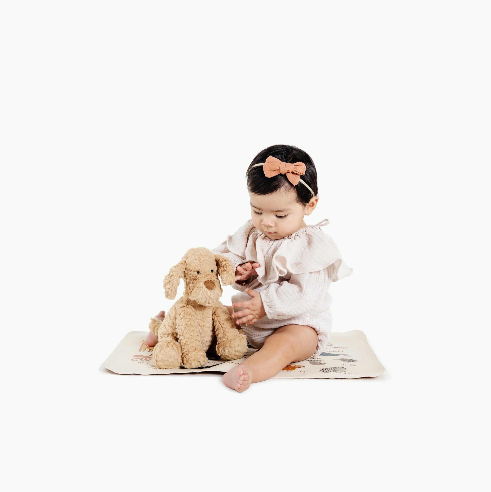 Animal Alphabet@Baby sitting on the Animal Alphabet Micro mat 