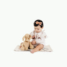 Animal Alphabet@Baby sitting on the Animal Alphabet Micro mat 