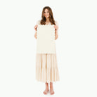 Ivory Scallop@Woman holding the Ivory Scallop Micro mat 