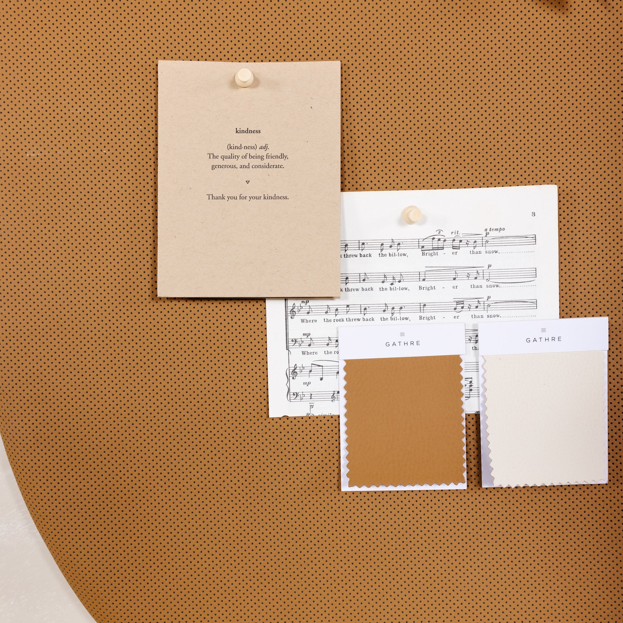 Camel@Close-up of pinboard showing premium materials and clean design