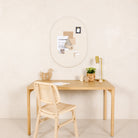 Ivory (on sale)@Neutral pinboard mounted on wall in living room setting