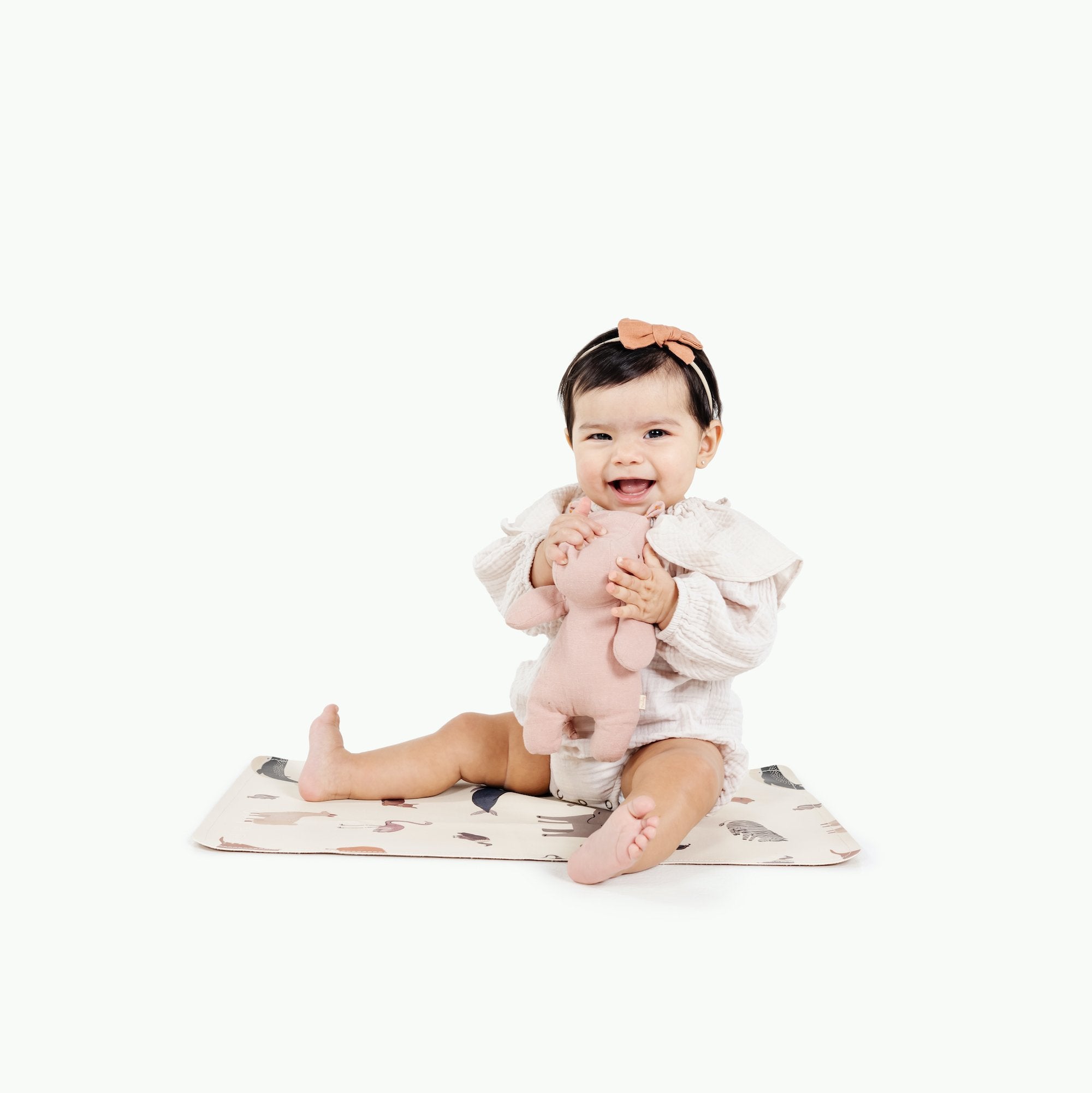 Menagerie@Baby sitting on the Menagerie Micro mat